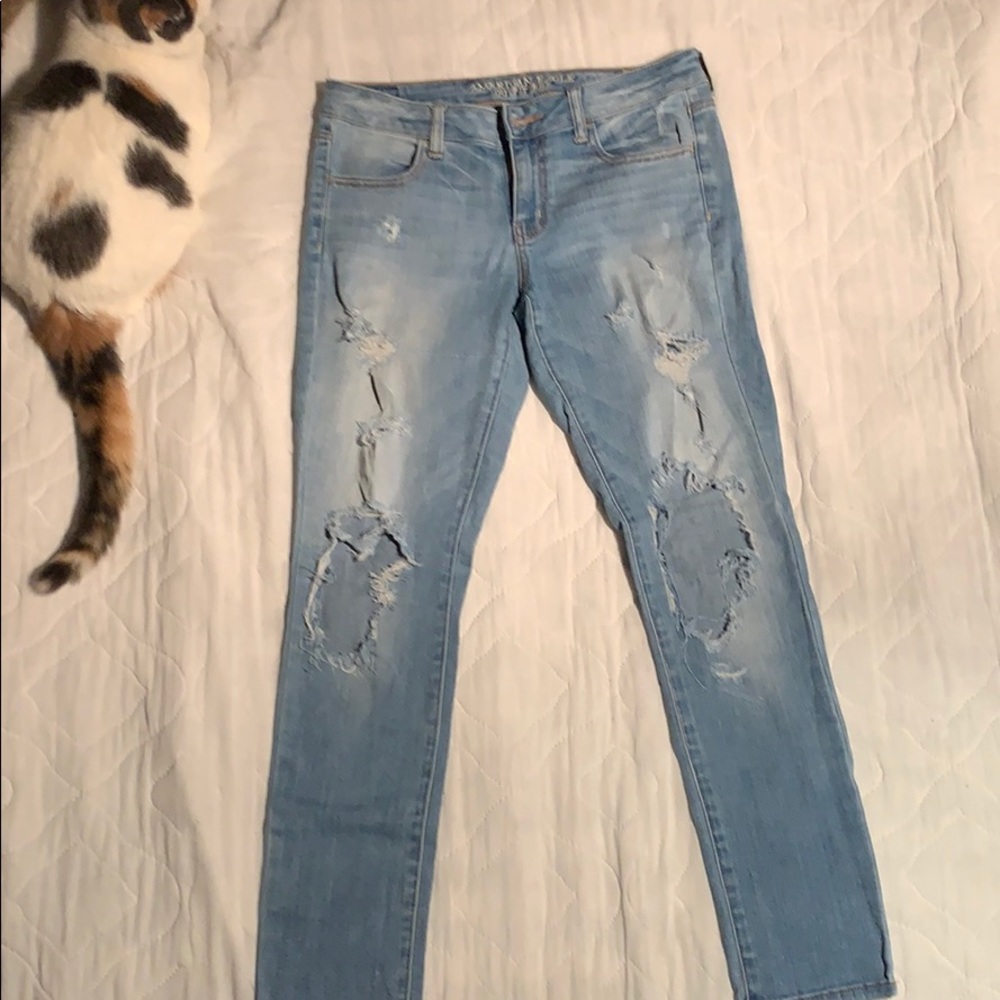 Distressed light wash jeans